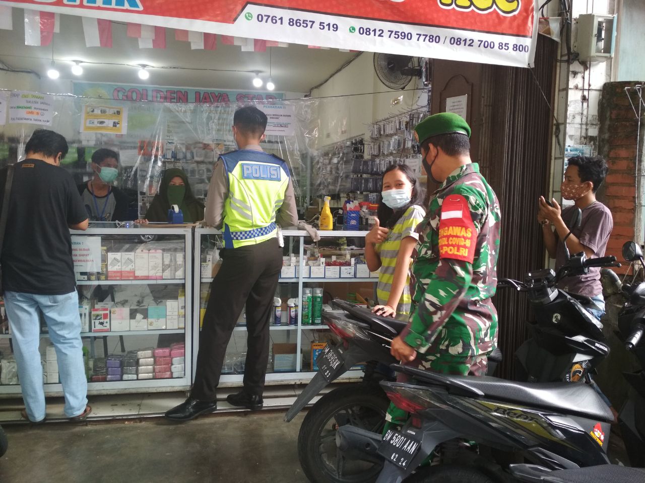 Babinsa Kelurahan Kotabaru Gelar Protokol Kesehatan di Pasar Agussalim