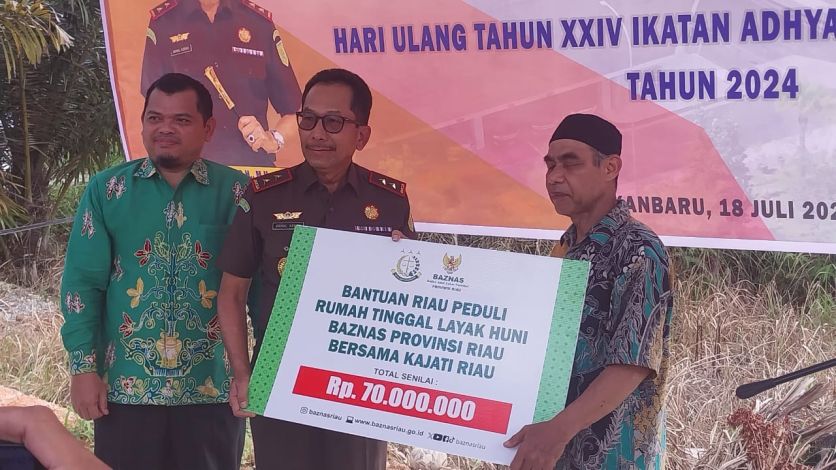 Bahagianya Parman, Dapat Bantuan Rumah Layak Huni dari Kejati Riau
