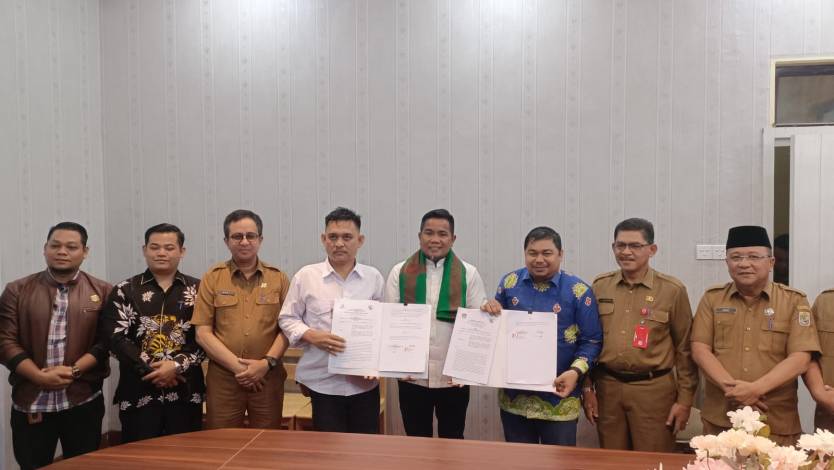 Teken MoU Dana Hibah Pilkada 2024, Pemkab Pelalawan Kucurkan Rp47,6 Miliar