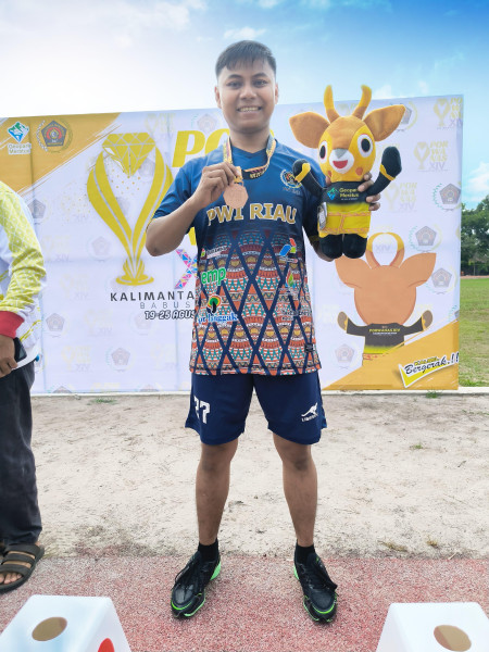 Finish ke Empat Lari 5.000 Meter, Rahmat Hidayat Raih Medali Pertama Porwanas untuk Riau