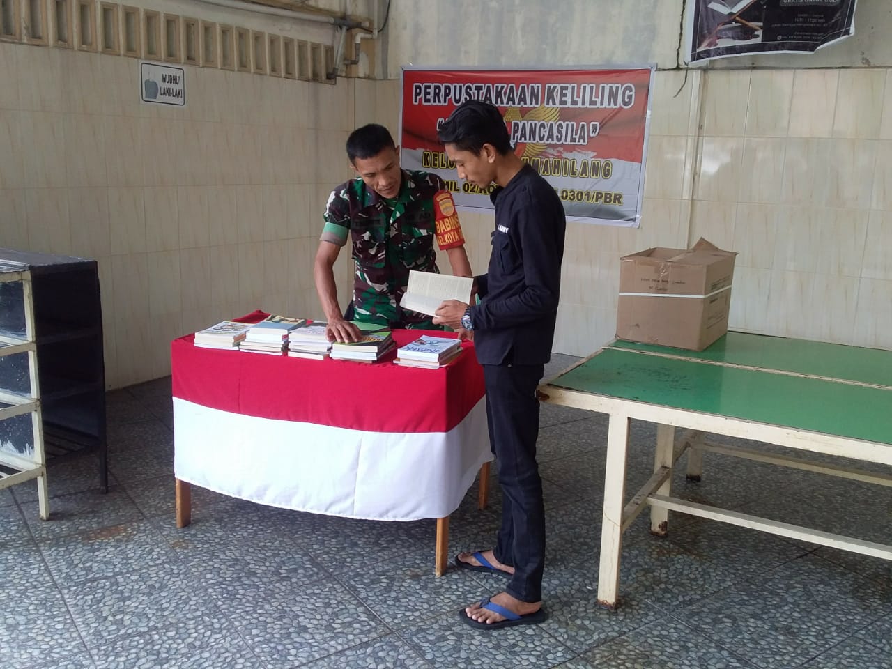 Buka Perpustakaan Keliling di Kampung Pancasila, Ini Pesan Serka TM Sihite 