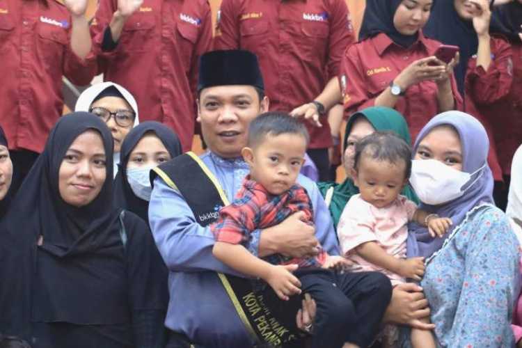 Pj Walikota Pekanbaru Dikukuhkan sebagai Bapak Asuh Anak Stunting