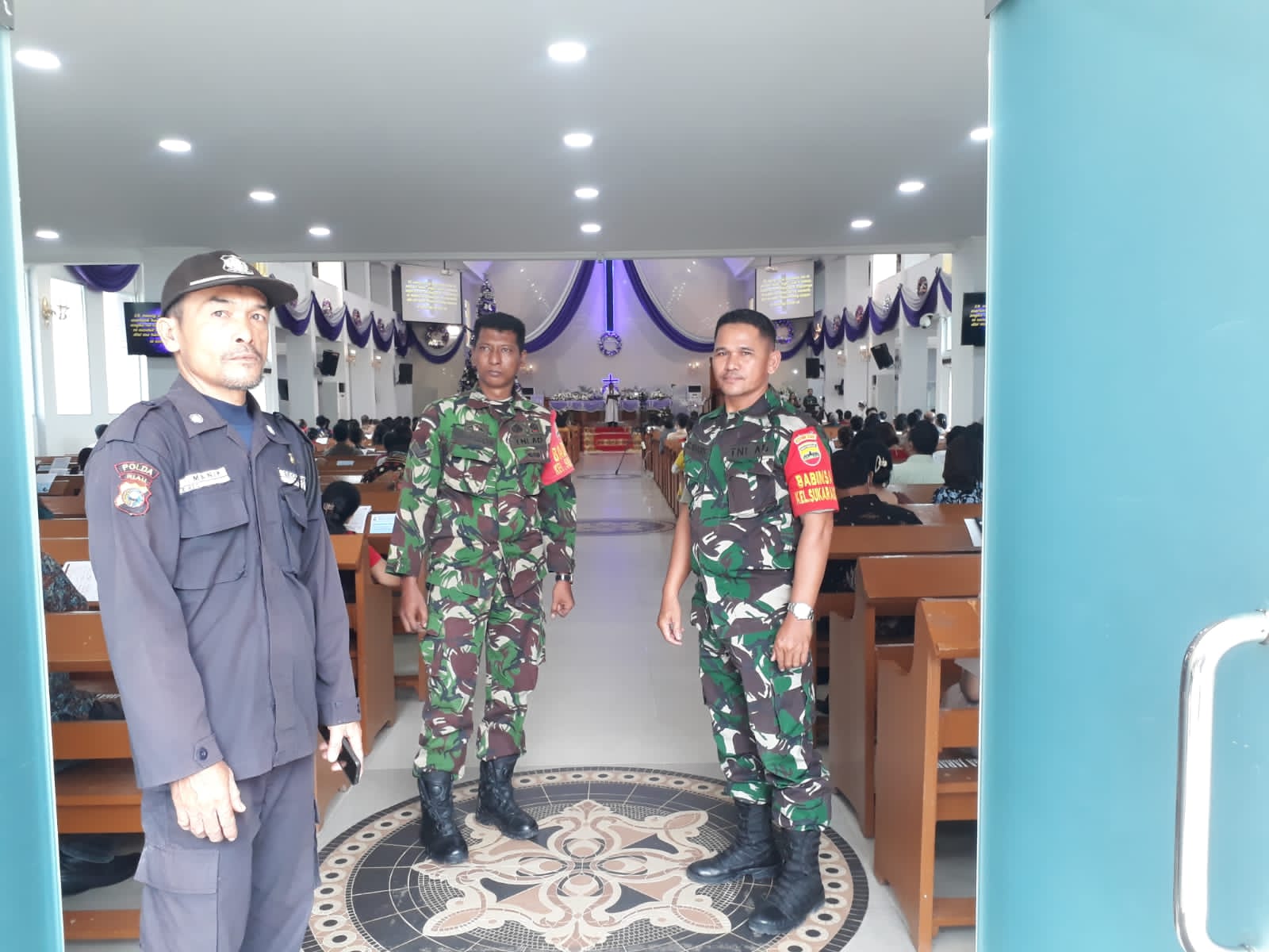 Babinsa -Bhabinkamtibmas Kordinasi Pengamanan Jelang Nataru di Gereja HKBP